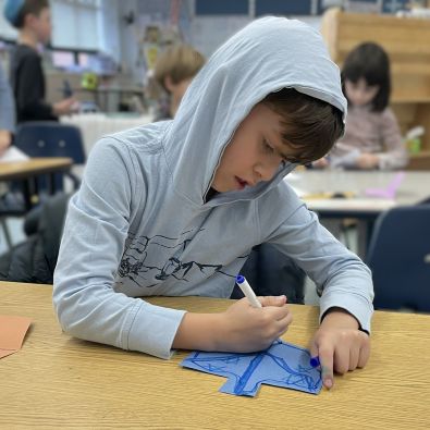 isaac decorates dreidel- smaller.jpg